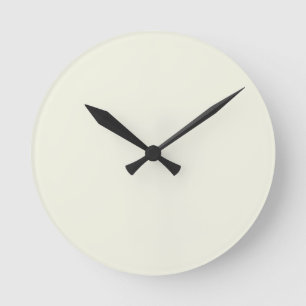 Horloge murale jaune beurre pâle uni