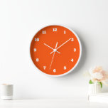 Horloge murale orange avec couleurs et police pers<br><div class="desc">Belles couleurs personnalisables Horloges murales - Choisissez / ajoutez vos couleurs arrière - plans et numériques préférées ! Choisissez vos polices numériques uniques ! ou Ajoutez votre texte / nom / date / logo / image ...  ou sinon :) Bonne chance - Soyez heureux :)</div>