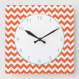 Horloge murale orange élégante de Chevron