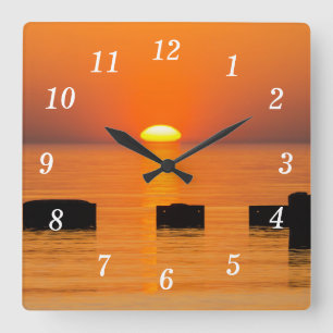 Horloge murale orange montante