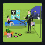 Horloge murale rétro en couple urbain<br><div class="desc">Cette horloge murale rétro Urban Cartoon Couple met en scène le dessin animé d'un appartement penthouse élégamment décoré, donnant sur un horizon urbain. L'appartement dispose d'un sol vert et d'un mur en briques vertes. Sur le mur, quatre classiques Movie Martini Stretched Canvas Prints, également disponibles au magasin Zazzle de StrangeLittleOnion...</div>