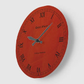 Horloge murale ronde à finition fausse Rosso Stucc (Angle)