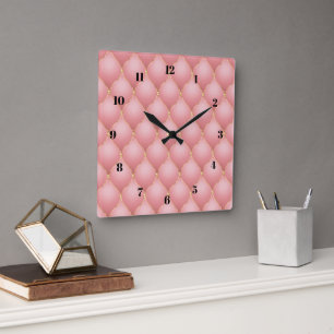 Horloge murale rose de diamants d'or