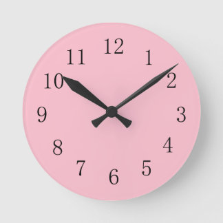 Horloge murale rose pâle