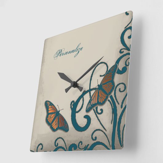 Horloge murale turquoise à rotation papillon (Angle)