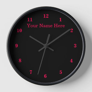 Horloge noire et rouge avec texte et couleurs pers