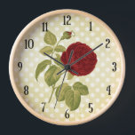 Horloge Pois de parchemin de rose rouge antique<br><div class="desc">Cette belle horloge design montre une rose rouge vintage graphique sur un arrière - plan de couleur parchemin en détresse qui a des pois blancs - crème. C'est un design élégant qui aura l'air joli dans votre maison. Parfait pour tous ceux qui aiment les fleurs victoriennes. Les numéros d'horloge sont...</div>