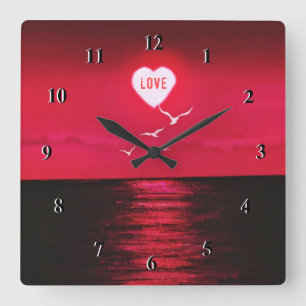 Horloge romantique du coucher de soleil sur la mer