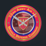 Horloge Ronde 32nd Army Air and Missile Defense Command<br><div class="desc">Display your pride in our Army's fabled 32nd Army Air and Missile Defense Command! This beautifully Keepsake Wall Clock makes a wonderful gift to any who are serving or have served in the 32nd Army Air and Missile Defense Command! Le 32e commandement de la défense aérienne et militaire est une...</div>