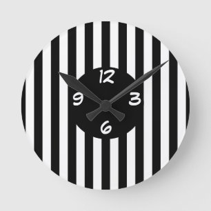 Horloge ronde à rayures noir et blanc