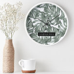 Horloge Ronde Aquarelle tropicale Oasis moderne Feuille Motif<br><div class="desc">Découvrez notre collection de Motifs Feuilles Oasis moderne Tropical, maintenant disponible sur Zazzle! Plongez dans la beauté vibrante de la nature avec ces produits étonnants qui ont une touche contemporaine sur le feuillage tropical.Choisissez parmi une large gamme de produits pour répondre à vos besoins et style personnel. Que vous cherchiez...</div>