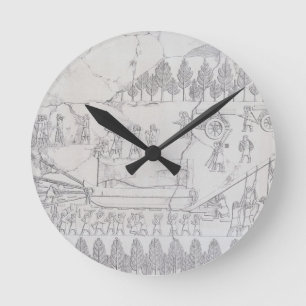 Horloge Ronde Assyriens déplaçant un Taureau à ailes sur un