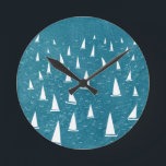 Horloge Ronde Bateau à voile<br><div class="desc">Une course en voilier sur un océan vert turquoise. Parfait pour votre navigateur favori,  coureur de yachts et fan de régate. Art nautique original par Nic Squirrell.</div>