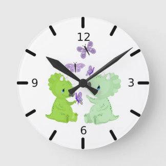 Horloge Ronde Bébés dinosaures et papillons -