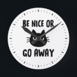 Horloge Ronde Black Cat Be Nice<br><div class="desc">A humorous wall clock for the home or office. "Be Nice or Go Away" with black cat. Makes est empoisonné. Check out of Jenn's Doodle World for even more novelty clocks and animal themed home decor.</div>