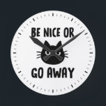 Horloge Ronde Black Cat Be Nice<br><div class="desc">A humorous wall clock for the home or office. "Be Nice or Go Away" with black cat. Makes est empoisonné. Check out of Jenn's Doodle World for even more novelty clocks and animal themed home decor.</div>