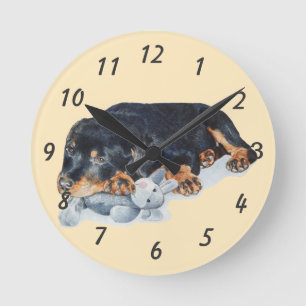 Horloge Ronde chien de caresse de rottweiler d'ours de nounours