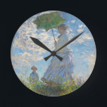 Horloge Ronde Claude Monet | Femme avec un parasol<br><div class="desc">Femme avec un parasol - Madame Monet et son fils,  1875 (huile sur toile)| par Claude Monet | Lieu de l'art : National Gallery of Art Washington DC| Artiste français | Numéro de collection d'images : XOS741899</div>