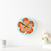 Horloge Ronde Clic de mur de fleurs tropicales orange (Maison)