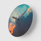 Horloge Ronde Clouds illuminated and rising sun (Angle)