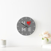 Horloge Ronde Coeur de la maison moderne sur gris (Maison)