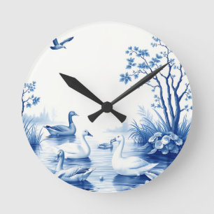 Horloge Ronde Cygnes de Blue Willow sur un lac