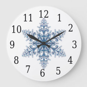 Horloge ronde de flocon de neige bleu