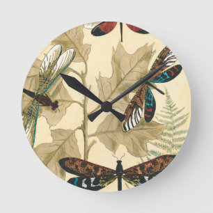 Horloge Ronde Des libellules colorées flottent au-dessus des Feu
