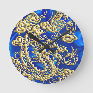 Horloge Ronde Dragon d'or embouti sur papier satin bleu