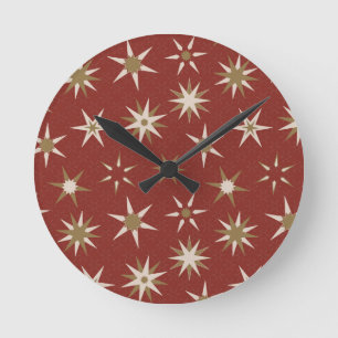 Horloge Ronde Etoiles de Noël Gold Geo - sur motif rouge.