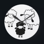 Horloge Ronde Famille de moutons noirs<br><div class="desc">Mignonne famille de moutons noirs.</div>
