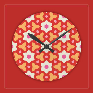 Horloge Ronde Fleurs modernes sur rouge et pêche géométrique Flo