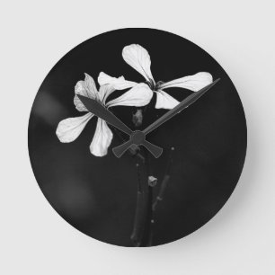 Horloge Ronde floral noir et blanc minimaliste