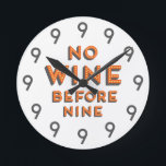 Horloge Ronde Funny Modern Wall Clock<br><div class="desc">Funny Wall Clock en orange et blanc, design moderne. Texte sur le clock says No Wine before Nine and all the numbers are 9 ! Le poison de Perfect Christmas, le poison de Holiday, le poison de Housewarming, le poison de Father's day, le poison de Mother's day ! Visit our...</div>