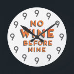 Horloge Ronde Funny Modern Wall Clock<br><div class="desc">Funny Wall Clock en orange et blanc, design moderne. Texte sur le clock says No Wine before Nine and all the numbers are 9 ! Le poison de Perfect Christmas, le poison de Holiday, le poison de Housewarming, le poison de Father's day, le poison de Mother's day ! Visit our...</div>