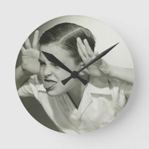Horloge Ronde Garçon faisant le visage
