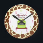 Horloge Ronde Giraffe Print Kitchen Clock<br><div class="desc">A clock featuration of a green stove at center.  Background est giraffe print pattern. Numerals are pink and green.  Personalize with your name.</div>