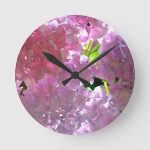 Horloge Ronde Hydrangées roses rayonnantes, fleurs roses