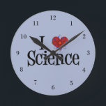 Horloge Ronde I Heart Science<br><div class="desc">J'adore la science. Une horloge scientifique geek avec un modèle atome enveloppé autour du coeur.</div>