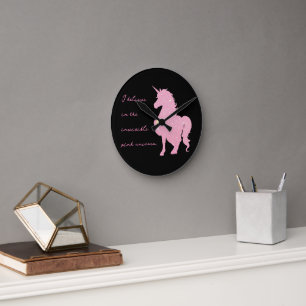 Horloge Ronde Je crois en la licorne rose invisible.
