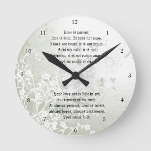 Horloge Ronde L'amour n'échoue jamais floral blanc d'écriture