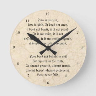 Horloge Ronde L'amour n'échoue jamais le cru chrétien marbré