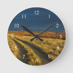 Horloge Ronde Le coucher de soleil met en valeur l'écorce rouge 