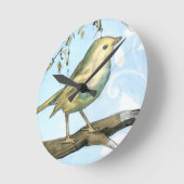 Horloge Ronde Le petit oiseau jaune était perché sur une branche (Angle)