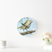 Horloge Ronde Le petit oiseau jaune était perché sur une branche (Maison)