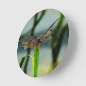 Horloge Ronde Libellule rouge et noire repérée (Angle)
