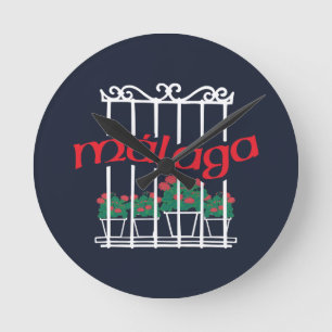 Horloge Ronde Malaga, fenêtre avec des fleurs