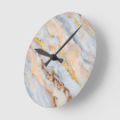 Horloge Ronde Marbre fluide dans des tons de gris, pêche et or (Angle)