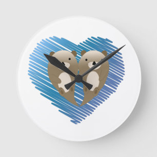 Horloge Ronde Mignonnes loutres au coeur bleu dans l'Arrière - p
