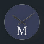 Horloge Ronde Monogramme et nom personnalisés bleu marine<br><div class="desc">Monogramme personnalisé et design de nom caractéristiques monogramme personnalisé et nom dans le style de police serif classique.</div>